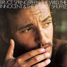 album cover of bruce springsteen's the wild innocent and the e street shuffle. bruce with hand on his mouth with a pensive look